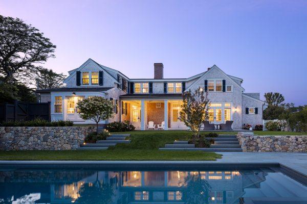 A sensitively restored 1870 Greek Revival with a new improved connection to the outdoors including a new pool and terraced landscaping.