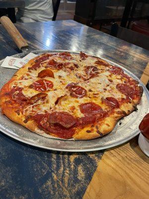 Large pepperoni pizza.