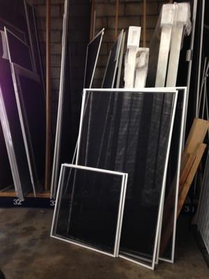 New window screens. Our frames use heavy duty aluminum corners, springs, and tabs, to match whatever style screen you have.