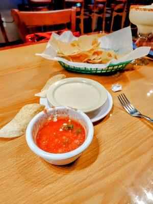 Salsa, queso and chips.