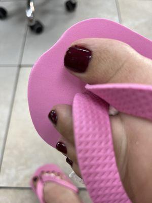 Both big toes were bubbly and painted horribly.