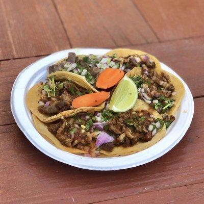 Regular tacos: Al pastor, lengua, carne asada, tripas