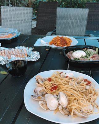 Our own wine, on our back patio, out of plastic containers