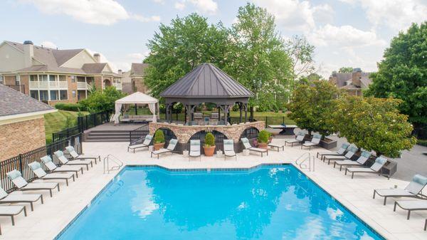 Pool with terraced sundeck and gazebo.