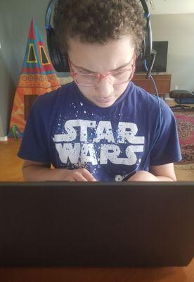 My son getting his 'code on'.