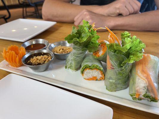 Fresh spring roll appetizer. It is served with three sauces that are each even better than the last.