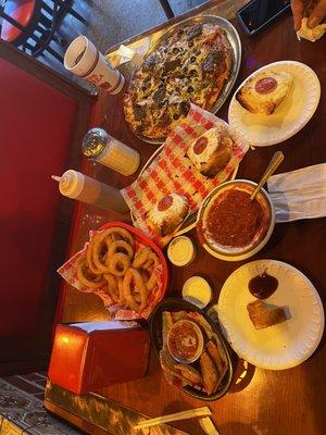 Raviolis, onion rings, Italian cheese bread, 12" super deluxe