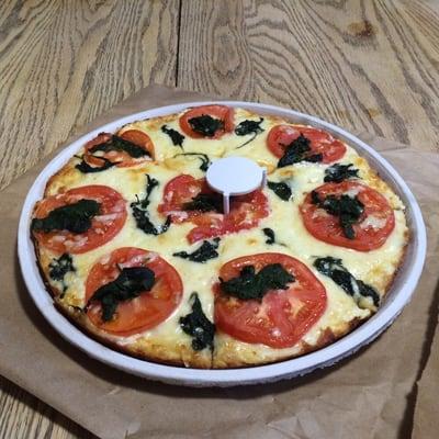 Greek pizza add tomato and spinach.