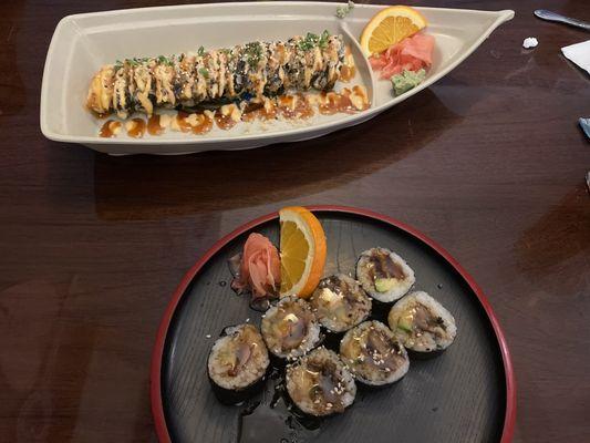 On white plate is Crunchy Roll (S40 on menu)  Black and red plate is eel roll S22 on menu)