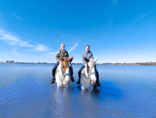 Horseback riding in ocean and riding on the beach in Florida