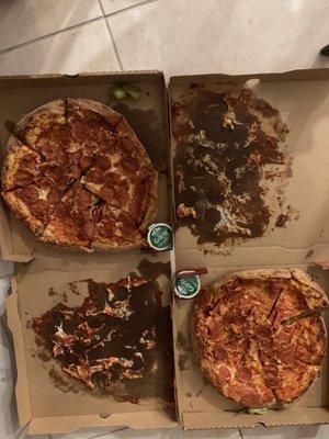 Driver called and said there was an issue so he had to go back to the shop. Pizzas came to us like this, cold. Clearly have been dropped