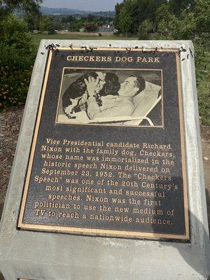 Plaque with the history of the dog park