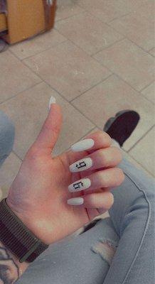 White coffin nails with clear/black stickers