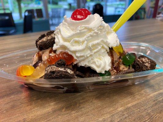 Dirty Worm. Chocolate ice cream, chocolate sauce, Oreo crumbles, gummy worms, whip & cherry.