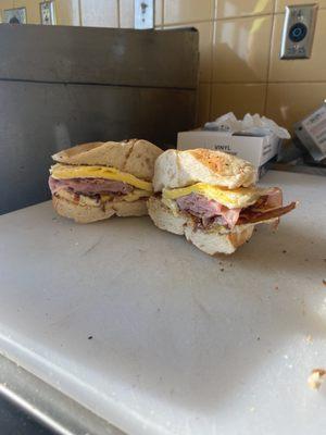 Ham bacon eggs cheese on a toasted bagel