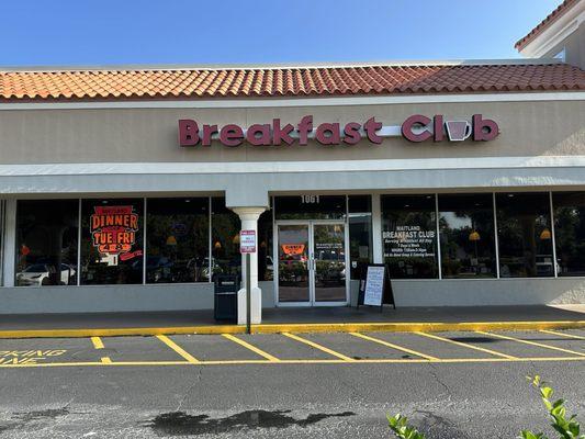 Restaurant storefront from parking lot