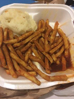 The fries and mashed potatoes looked good, but the fries were bland and the mashed potatoes were powdery.