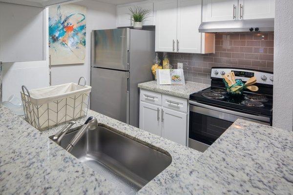 Granite and Stainless inside The Huxley at Medical Center.