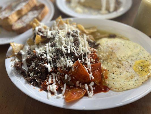 Chilaquiles with egg and asada