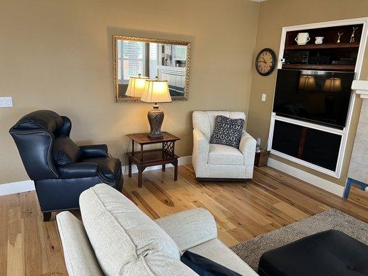 Leather recliner, swivel chair with accent pillows.  Amazing quality.  Fabric on Swivel chair matches our sectional.