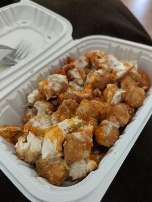 Medium Kiki's tots, extra garlic, w/ chicken (it's not spicy at all)