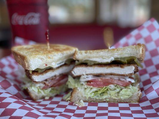 Santa Fe chicken special (sourdough, pepper jack, green chile, chicken patty) & fixins'