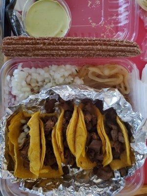 My FAVORITE.....Beef tacos with must have verde sauce. Churro extra not a fan