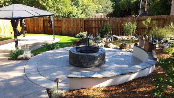 Complete backyard design and install with fire pit, pond and waterfall and patio covers