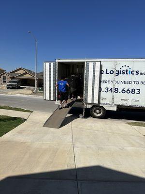 Moving my things into the truck.