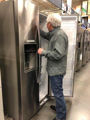 $1399 Whirlpool. Literally the only refrigerator that will fit in the cubby in our kitchen.