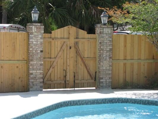 Pool privacy fence and gate by Mossy Oak Fence