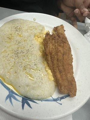 Fish and grits.. you see that butter all in them grits