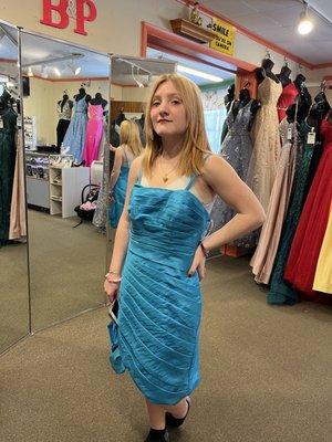 My oldest daughter trying on dresses for her confirmation