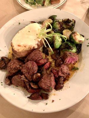 Steak bites with sausage, twice baked potato and the seasonal vegetable was Brussel sprouts