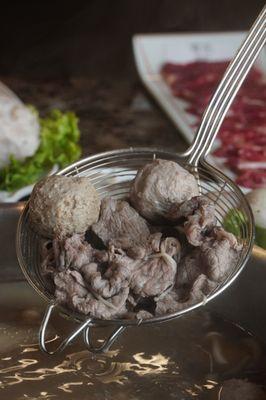 Cooked beef clices and beef balls