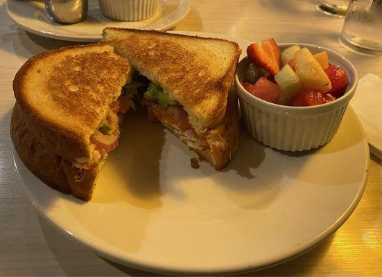 Grilled cheese with turkey, onion, tomato, and avocado