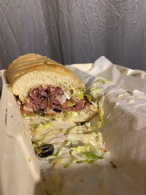 Large pastrami on white with everything + olives and banana peppers