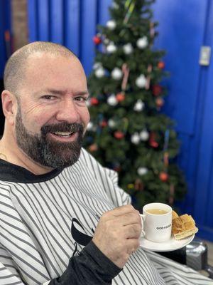 John always smiling and the best cafecito!