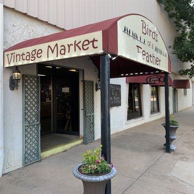 Covered entryway for Birds of a Feather Vintage Market.