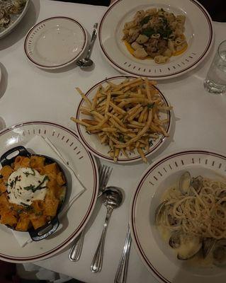 Baked rigatoni, French fries, homemade pork lumache and homemade bucatini with clams