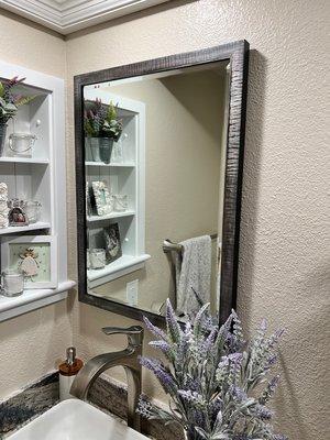 Guest bathroom, with single mirror above sink. Measurements needed to be precise here due to shelves and faucet placement!