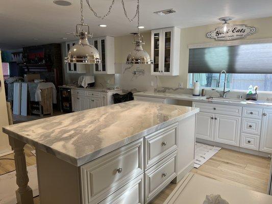 Calcatta premium countertops along the wall