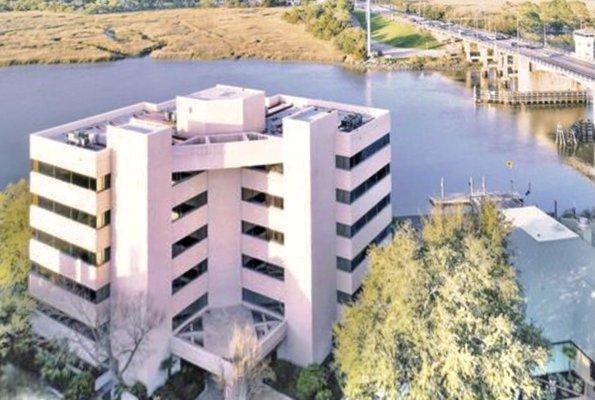 Uricchio Law Firm building exterior next to drawbridge over Wappoo Creek/Intracoastal Waterway between West Ashley and James Island