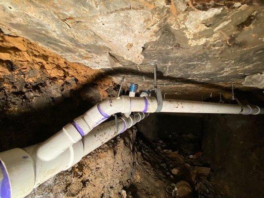 New pvc sewer drainage suspended from slab