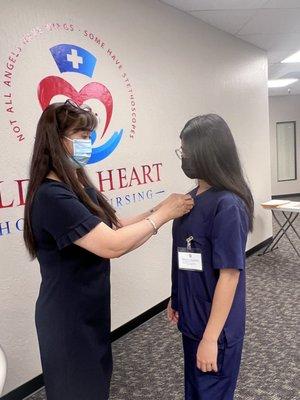 CNA Sandy receiving her pin