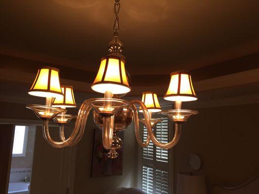 Sparkling chandelier and plantation shutters!