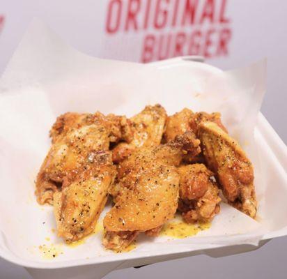 Our signature lemon pepper wet wings are a crowd favorite.