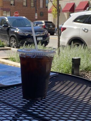 Cold brew, strong hazelnut tones, feat. patio view of downtown Owatonna