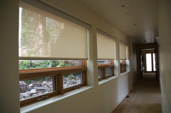 Interior motorized shades with cassette headbox cover.