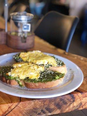 Avocado toast with scrambled egg on top